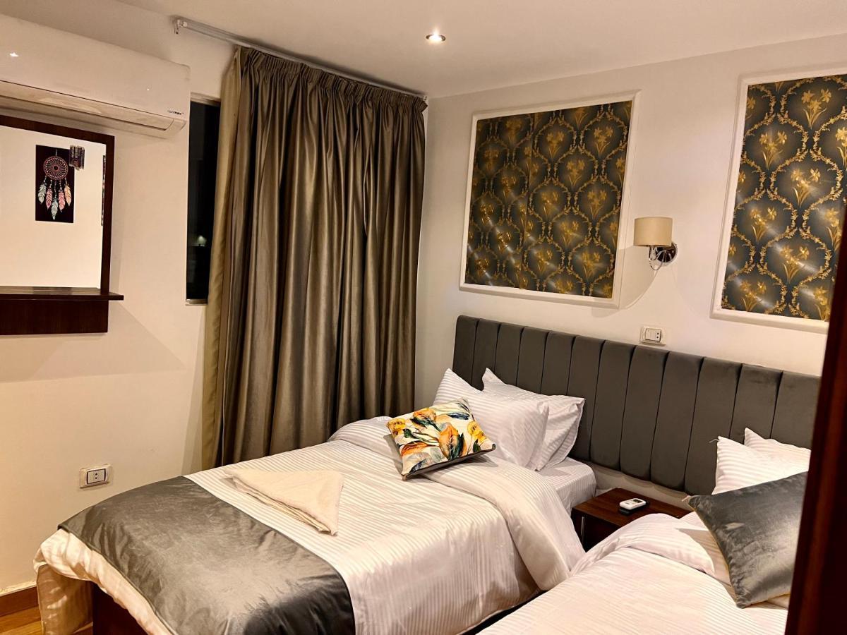 Grand Pyramids Inn Kafret el-Gabal Екстериор снимка