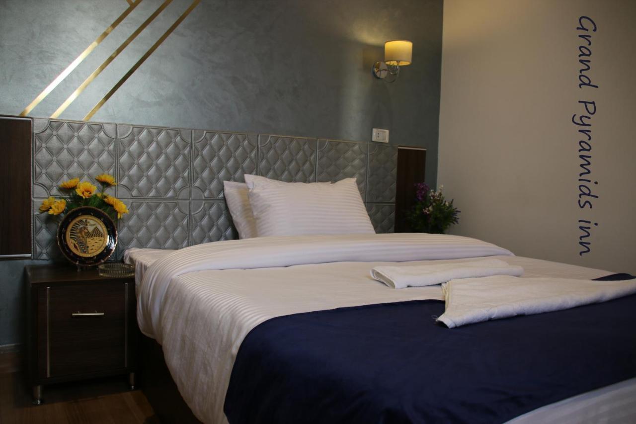 Grand Pyramids Inn Kafret el-Gabal Екстериор снимка