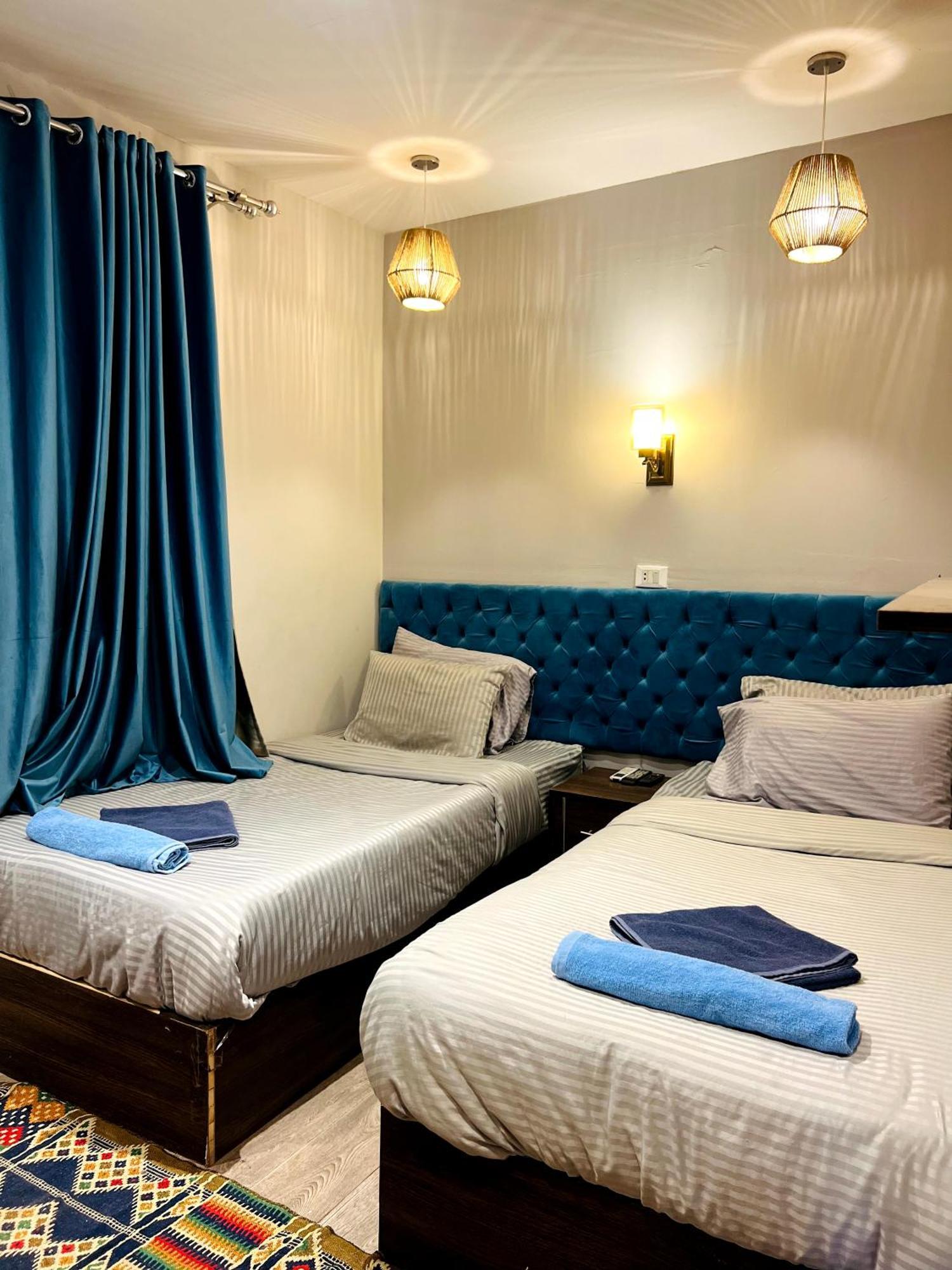 Grand Pyramids Inn Kafret el-Gabal Екстериор снимка